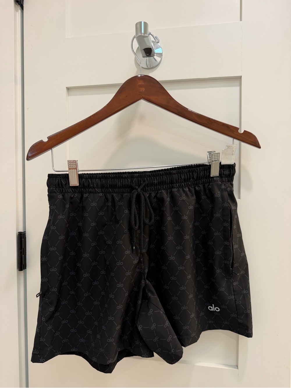 ALO Yoga Black Athletic Shorts with Subtle Logo Pattern